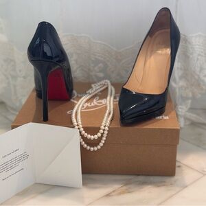 Christian Louboutin Glossy Black Heels with Red Soles